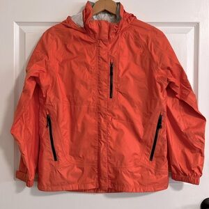 REI Rainier Rain Jacket, sequoia red coral color, sz Juniors XL, Women’s XS